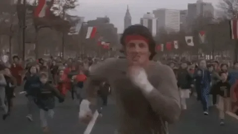 Rocky Balboa running down a parade